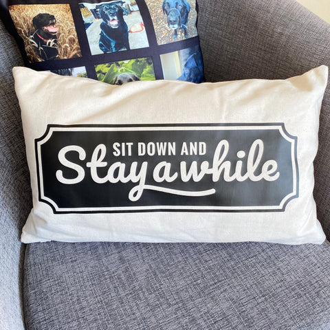 ‘Sit down and stay a while’ Fairtrade Cotton Canvas Cushion