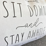 Flock ‘Sit down and stay a while' Fairtrade Cotton Canvas Cushion